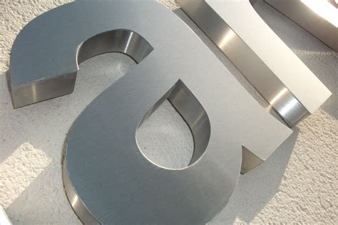 metal letter fabrication|stainless steel built up letters.